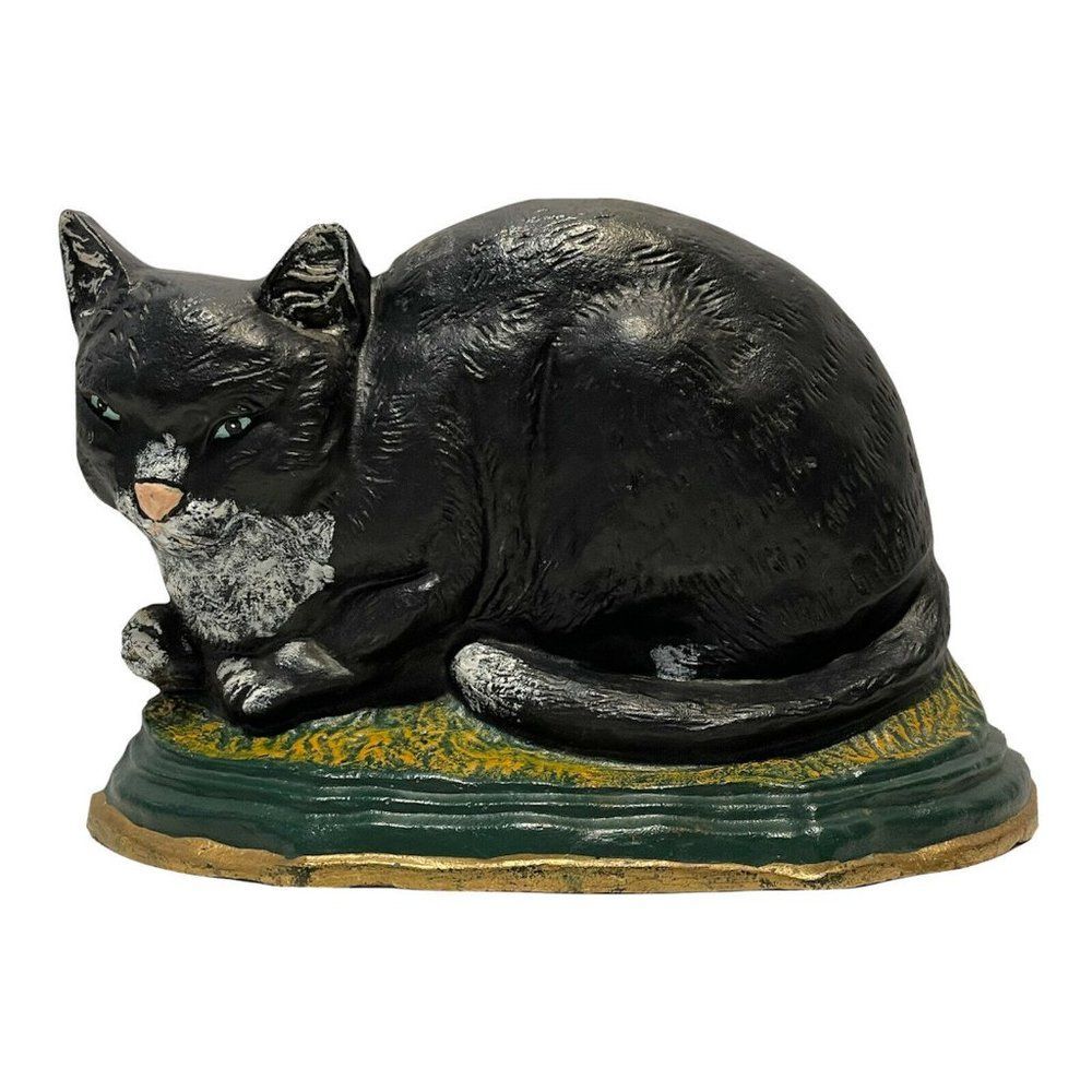 VINTAGE Painted Heavy Cast Iron Laying Blue Eye